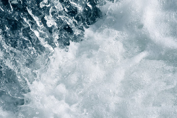 Blue and turquoise water with irregular wave structure