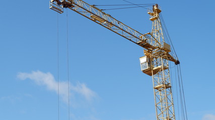 Fototapeta premium crane against blue sky