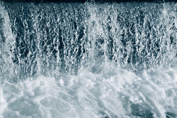 Blue and turquoise water with irregular wave structure