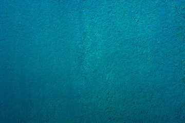 Fototapeta na wymiar Blue painted wooden surface with a rough texture