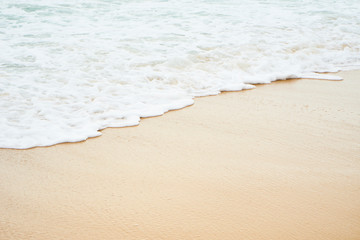 Soft wave of the sea on the sandy beach