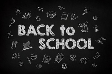 Back to school with education concept chalk text on chalkboard