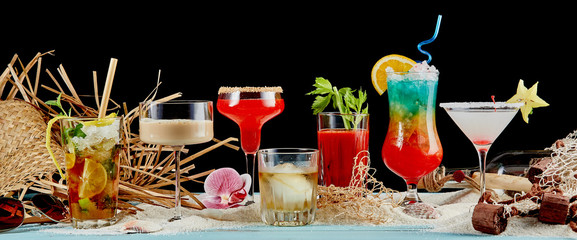 Variety of cocktails on black background