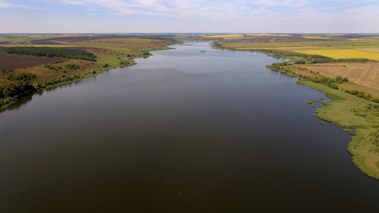 DCIM\100MEDIA\DJI_aerial photo of the big lake in the forest with cumulus clouds0028.JPG