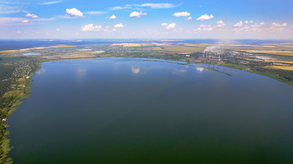 DCIM\100MEDIA\DJI_aerial photo of the big lake in the forest with cumulus clouds0028.JPG