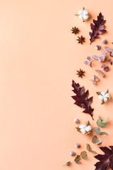 Creative autumn fall thanksgiving day composition with decorative leaves