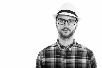 Studio portrait of young handsome man shot in black and white