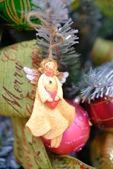 Angel doll toy on Christmas tree decoration for Christmas celebration festival
