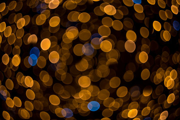 Beautiful bokeh of orange circles, evenly filling the spherical shape. Abstract background.