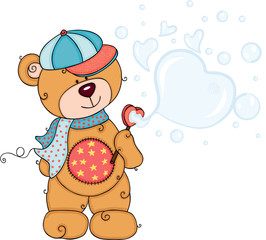 Teddy bear with cap and scarf blowing soap bubbles