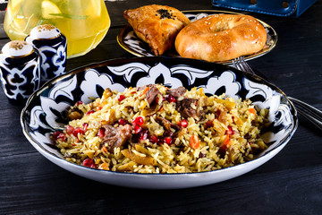 traditional pilaf with meat and pomegranate