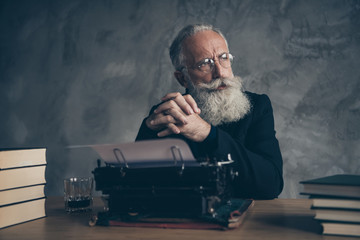 Close-up portrait of his he nice attractive bearded smart clever bewildered gray-haired...