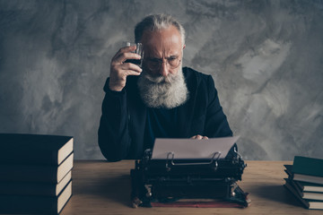 Portrait of his he nice attractive bearded gray-haired professional skilled creative publisher...