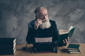 Portrait of his he nice attractive content dreamy bearded gray-haired professional expert publisher...