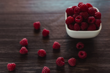 A bowl of fresh red raspberries