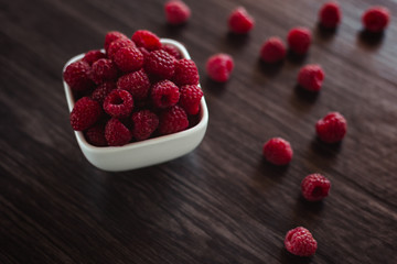 A bowl of fresh red raspberries