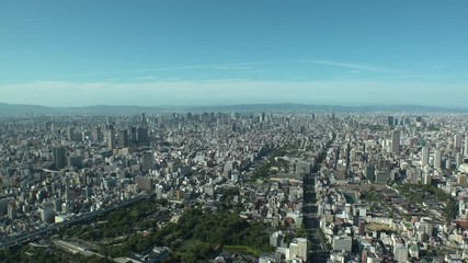 OSAKA, JAPAN - CIRCA SEPTEMBER 2019 : Aerial high angle view of CITYSCAPE of OSAKA in daytime. Osaka is the capital city of Osaka Prefecture and the second largest metropolitan area in Japan.