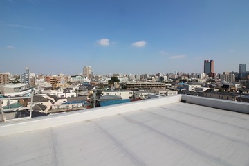 屋上防水と住宅地の眺望