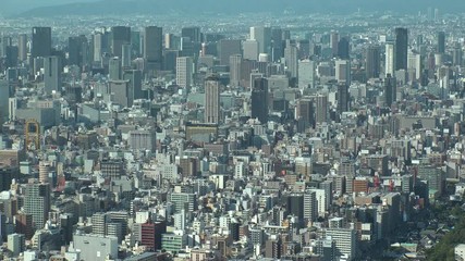 OSAKA, JAPAN - CIRCA SEPTEMBER 2019 : Aerial high angle view of CITYSCAPE of OSAKA in daytime. Osaka is the capital city of Osaka Prefecture and the second largest metropolitan area in Japan.