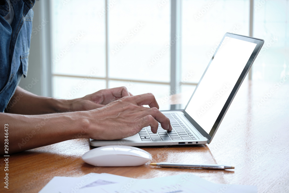 Poster hands of an online business entrepreneur is typing a keyboard on the laptop for checking order list 