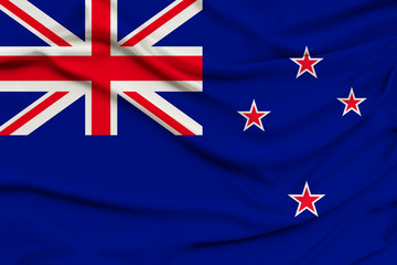 beautiful photograph of the New Zealand national flag on delicate shiny silk with soft draperies, the concept of state power, country life, horizontal, close-up, copy space