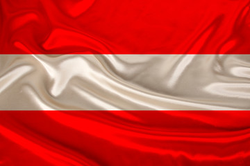 photo of the national flag of Austria on a luxurious texture of satin, silk with waves, folds and highlights, closeup, copy space, concept of state economy and politics, illustration