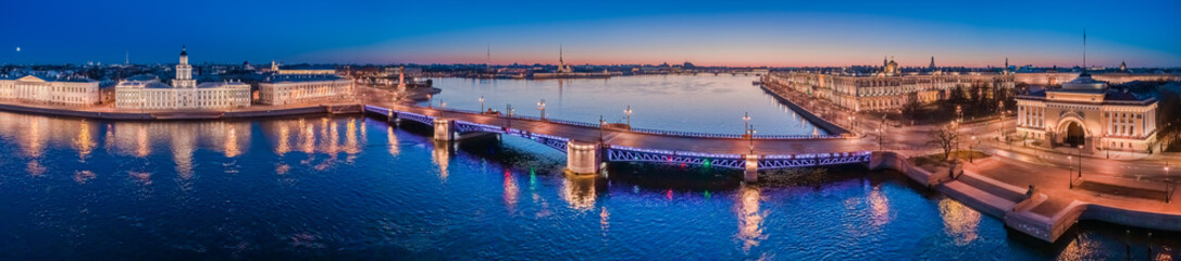 Panorama of evening St. Petersburg. Sights Of Russia. Rivers Of St. Petersburg. Bridges Of St. Petersburg. Palace bridge over the Neva. Vasilievsky island. Admiralty. Hermitage. Winter palace.