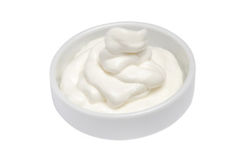 Fototapeta na wymiar Bowl with sour cream on white isolated background