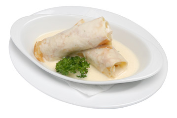 Spring rolls on a plate, restaurant food with cheese on a white isolated background