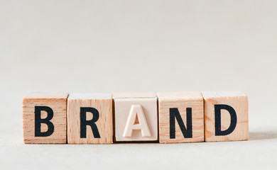 Fototapeta premium word BRAND on wooden cube block