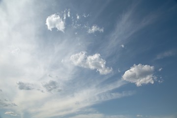 Bright sky with white clouds