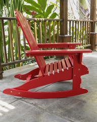 The red wood rocky chair in the backyard. 