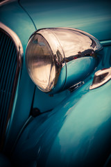 Headlight of a vintage classic car