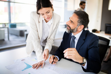 Business people working discussing as a team at the office