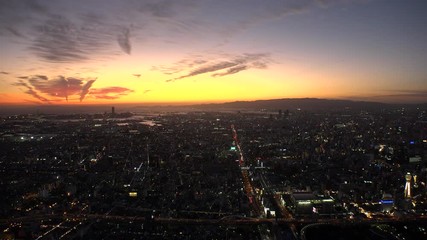 OSAKA, JAPAN - CIRCA SEPTEMBER 2019 : Aerial high angle view of CITYSCAPE of OSAKA in early evening sunset time. Osaka is the second largest metropolitan area in Japan.
