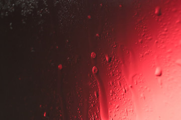 water drops on colored glass