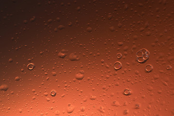 water drops on colored glass