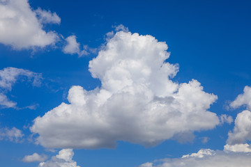 Naklejka na ściany i meble Fluffy cummulus clouds