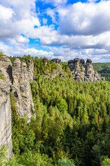 Bastei - View of beautiful rock formation in Saxon Switzerland National Park from the Bastei bridge - Elbe Sandstone Mountains near Dresden and Rathen - Germany. Popular travel destination in Saxony.