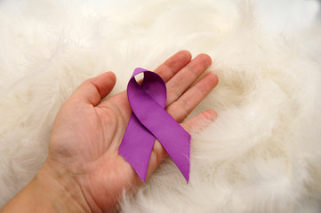 hand with chalk writing on board