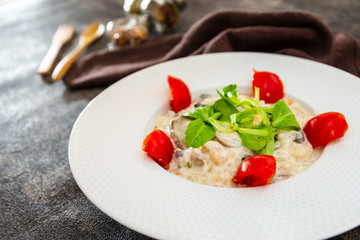 risotto with fresh cream, salted chicken, rehydrated ceps and mushrooms