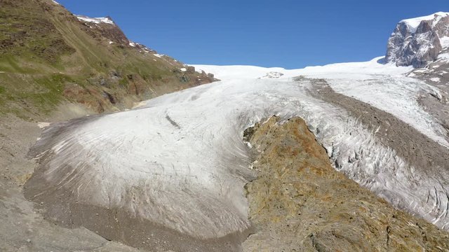 Aerial shot over Gornergletscher glacier tongue. Zermatt, Switzerland