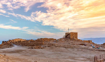 sunrise over ancient Masada fortress in Israel - obrazy, fototapety, plakaty