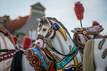 Fototapeta na wymiar A Group of Carousel Horses on a Fun Fair Ride.