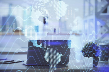 Stock market graph and table with computer background. Double exposure. Concept of financial analysis.