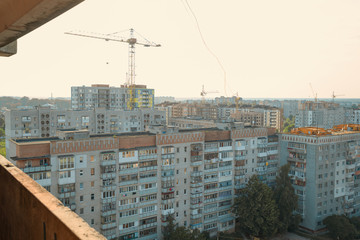 Fototapeta na wymiar 28/07/2019 Zhytomyr, Ukraine, mix of multi-storey roofs of both new and Soviet times buildings in the sleeping area