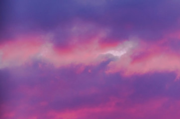 Colorful and Dramatic Sunset Storm Clouds in the Sky. Weather, Thunderstorm, Cloudscape Background.