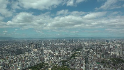 OSAKA, JAPAN - CIRCA SEPTEMBER 2019 : Aerial high angle view of CITYSCAPE of OSAKA in daytime. Osaka is the capital city of Osaka Prefecture and the second largest metropolitan area in Japan.