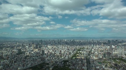 OSAKA, JAPAN - CIRCA SEPTEMBER 2019 : Aerial high angle view of CITYSCAPE of OSAKA in daytime. Osaka is the capital city of Osaka Prefecture and the second largest metropolitan area in Japan.