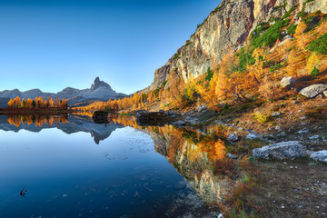 Fantastic autumn landscape. View on Federa Lake early in the morning at autumn